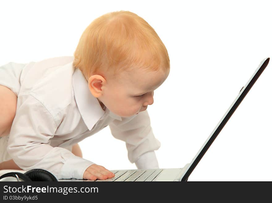 Baby boy using a laptop computer