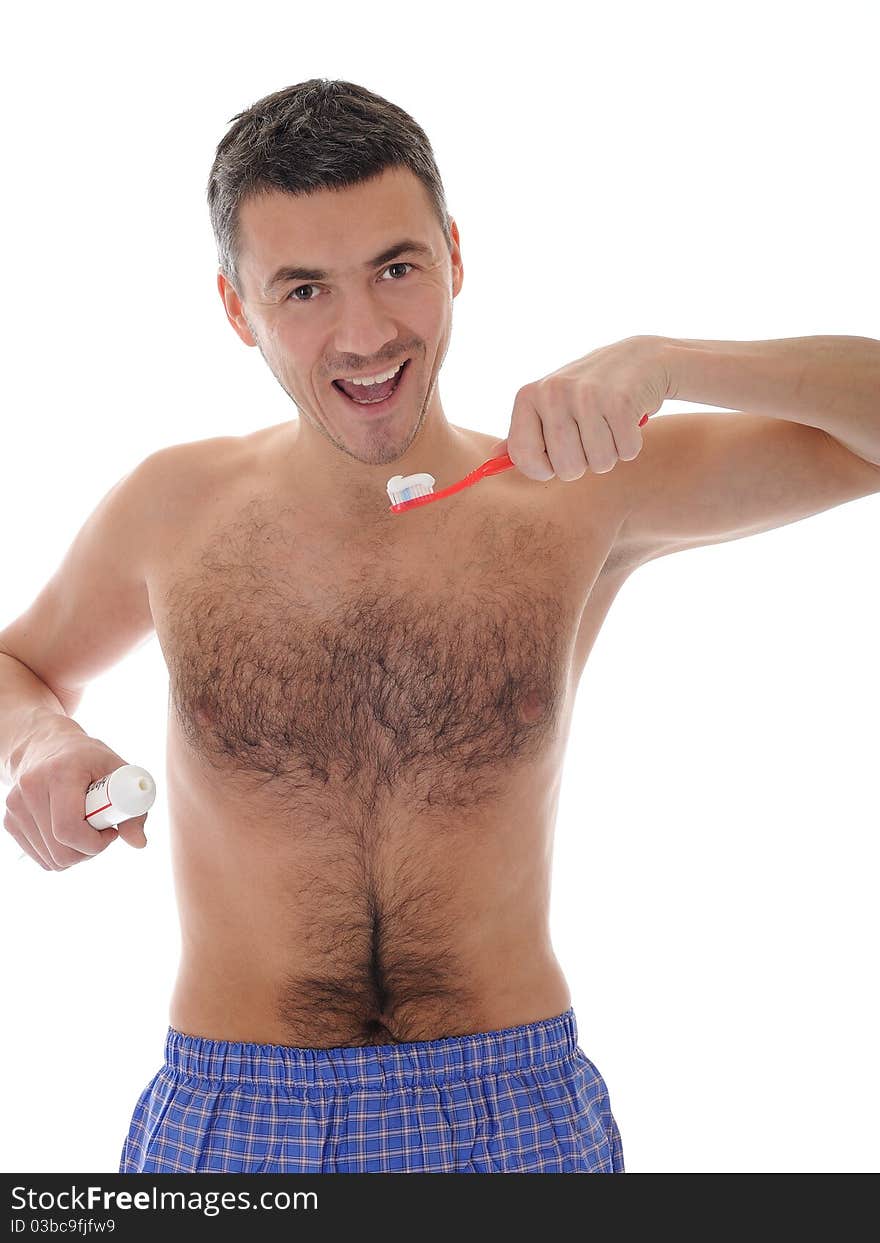 Middle aged man brushing his teeth in the morning. isolated on white background