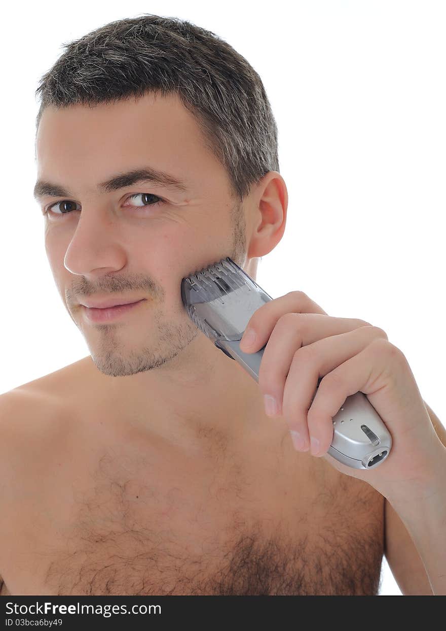 Young handsome male shaving face beard . isolated on white background