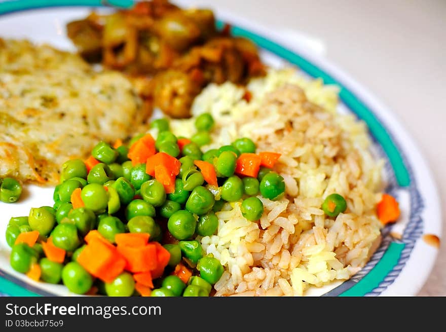 Healthy and balanced diet of seasoned fried rice, colorful peas and other ingredients. Healthy and balanced diet of seasoned fried rice, colorful peas and other ingredients.