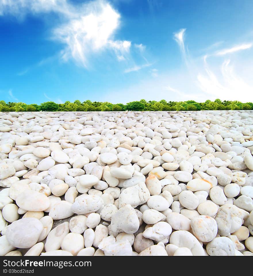 Pebble stack and sea waves on the background. Pebble stack and sea waves on the background