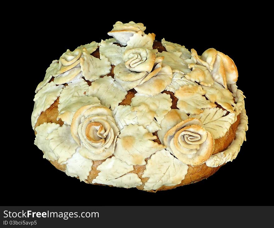 Wedding loaf of bread.
Just married couple have to kiss bread (symbol of the happiness through all life).