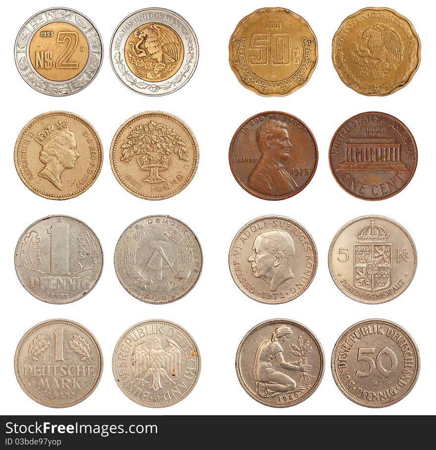 Coins of different countries closeup isolated on white background. Coins of different countries closeup isolated on white background