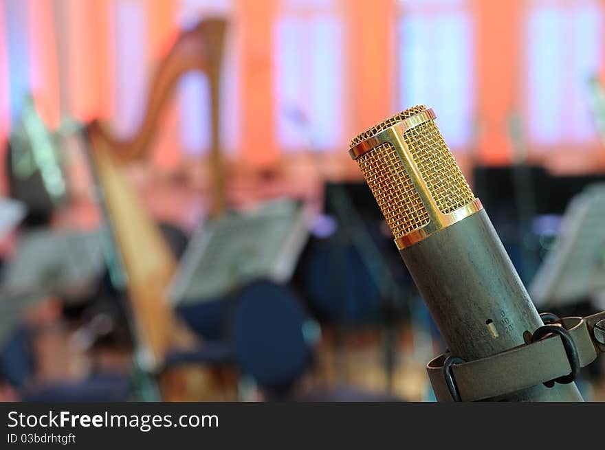 Microphone against the background of concert hall. Microphone against the background of concert hall.