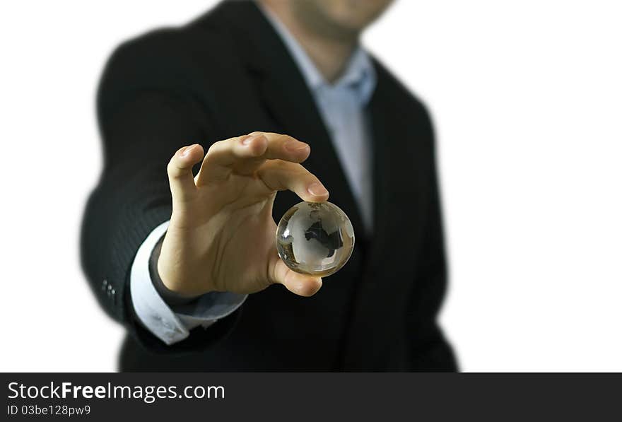 Businessman holding crystal globe