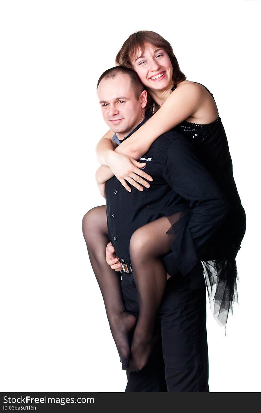 Portrait of a beautiful young happy smiling couple isolated on white