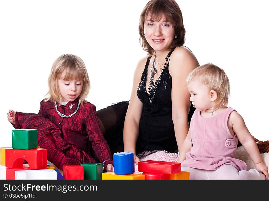 Children With Mother Playing With Blocks