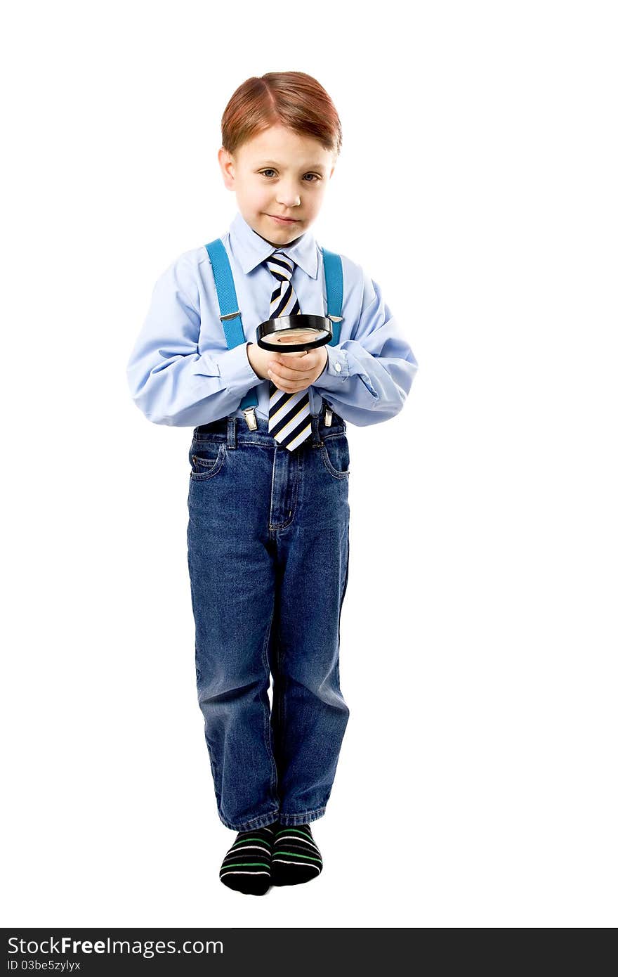 Young boy with magnifer