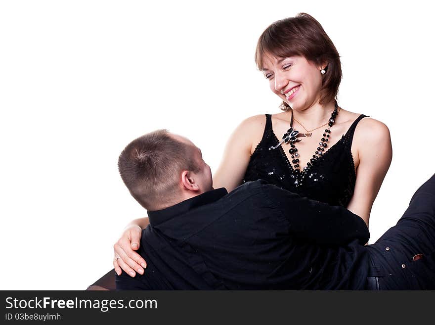 Portrait of a beautiful young happy smiling couple isolated on white