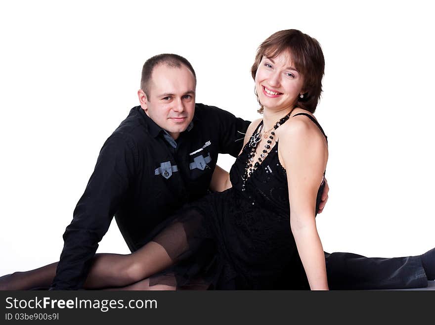 Portrait of a beautiful young happy smiling couple isolated on white