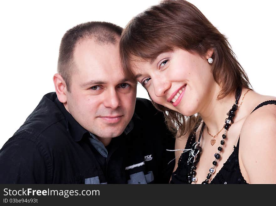 Portrait of a beautiful young happy smiling couple isolated on white