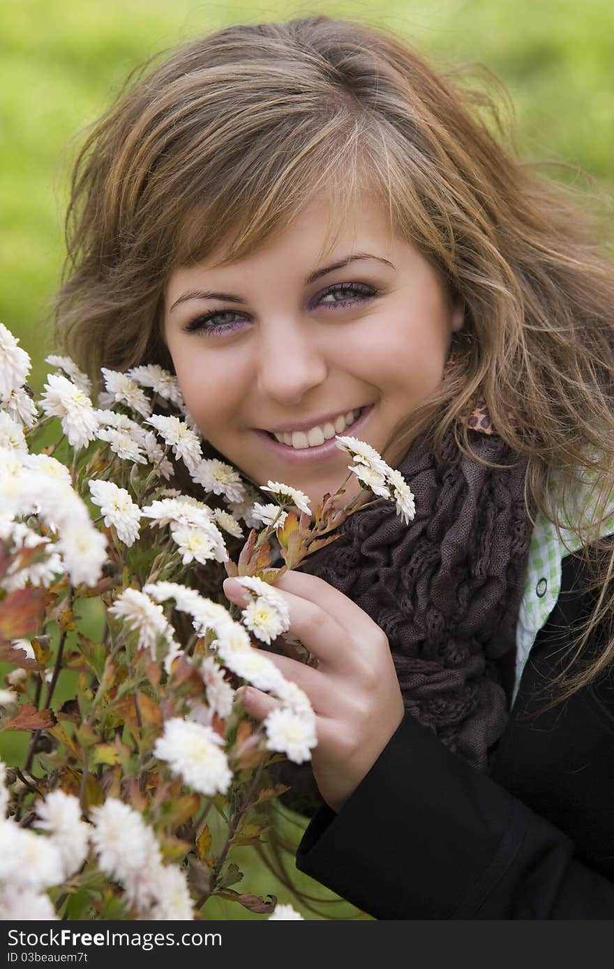 Portrait of beautiful young girl outdoors in autumn. Portrait of beautiful young girl outdoors in autumn