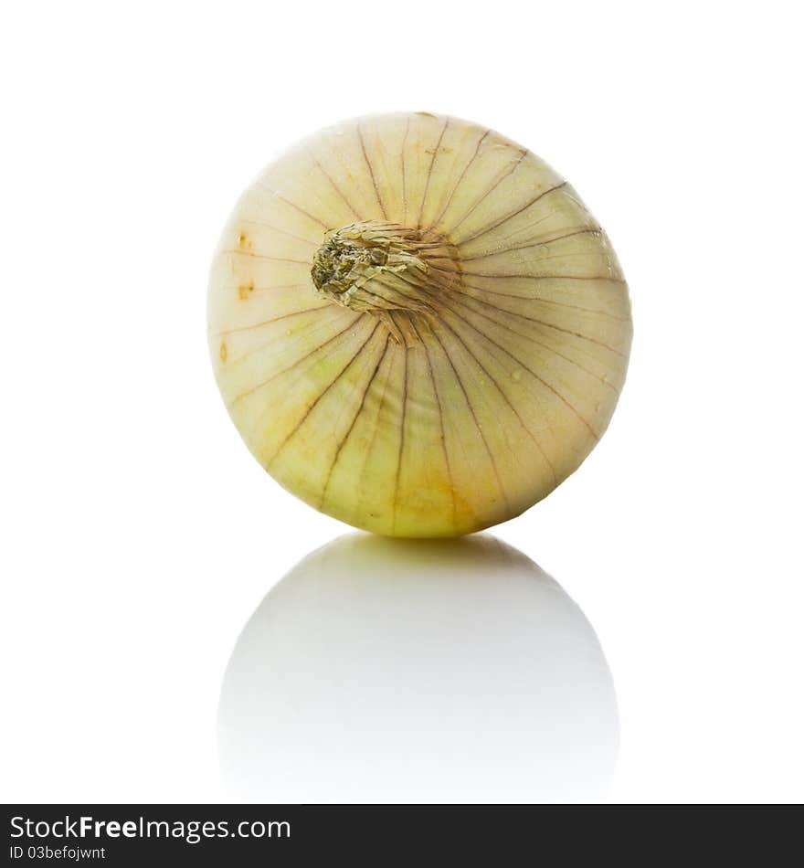 An fresh onion isolated on white background. An fresh onion isolated on white background