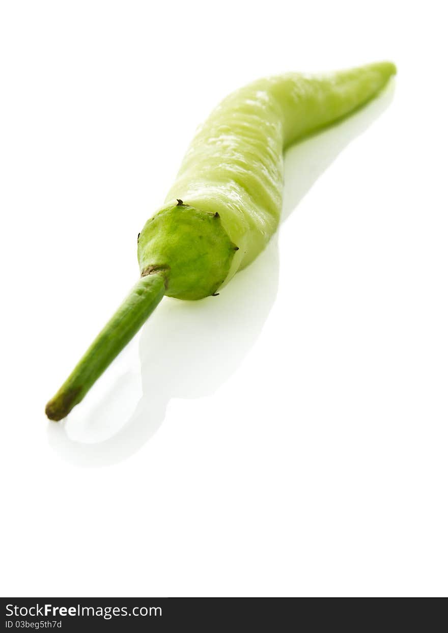 Fresh green chilly on white background