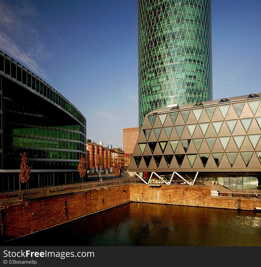 Two apartment buildings (on the right) and one office building (on the left) with a marina have been erected in Frankfurt right next to the Main River. Two apartment buildings (on the right) and one office building (on the left) with a marina have been erected in Frankfurt right next to the Main River.