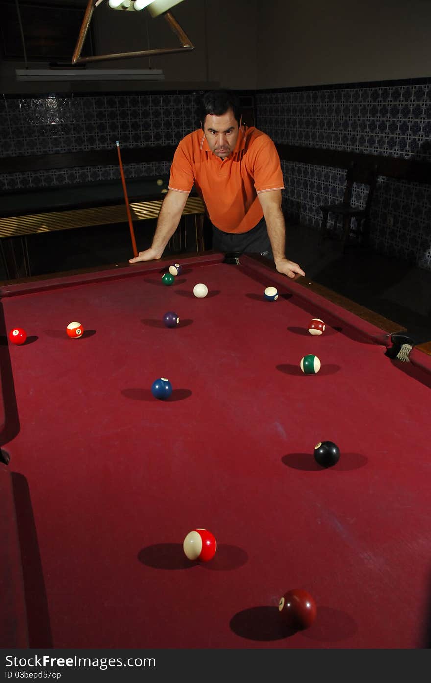 Person playing snooker