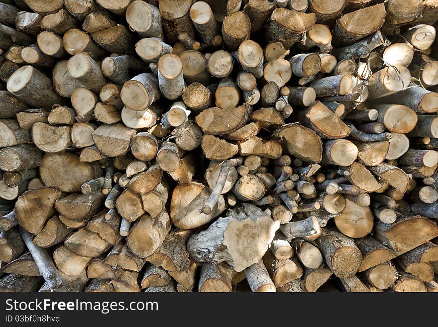 Stack of wooden logs awaiting the sawmill. Stack of wooden logs awaiting the sawmill