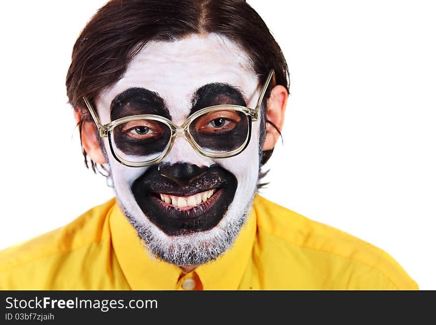 Portrait of a painted young man in studio. Portrait of a painted young man in studio