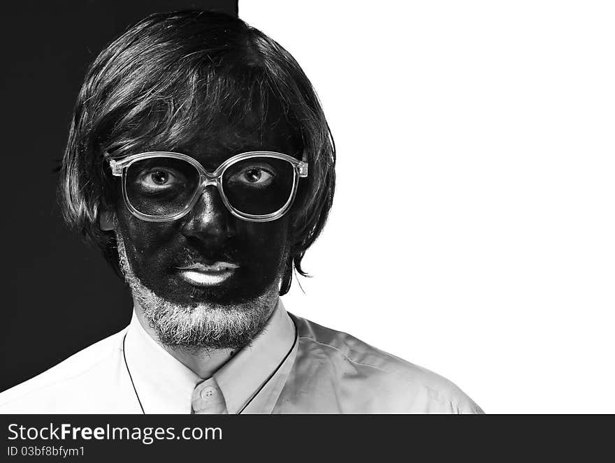 Portrait of a painted young man in studio. Portrait of a painted young man in studio