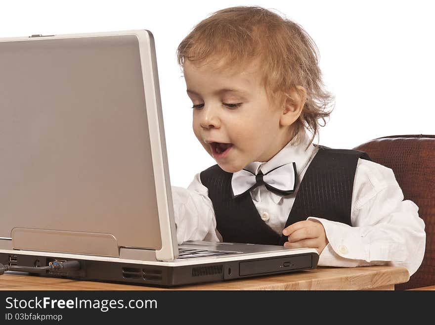 Little child and laptop Isolated on white background