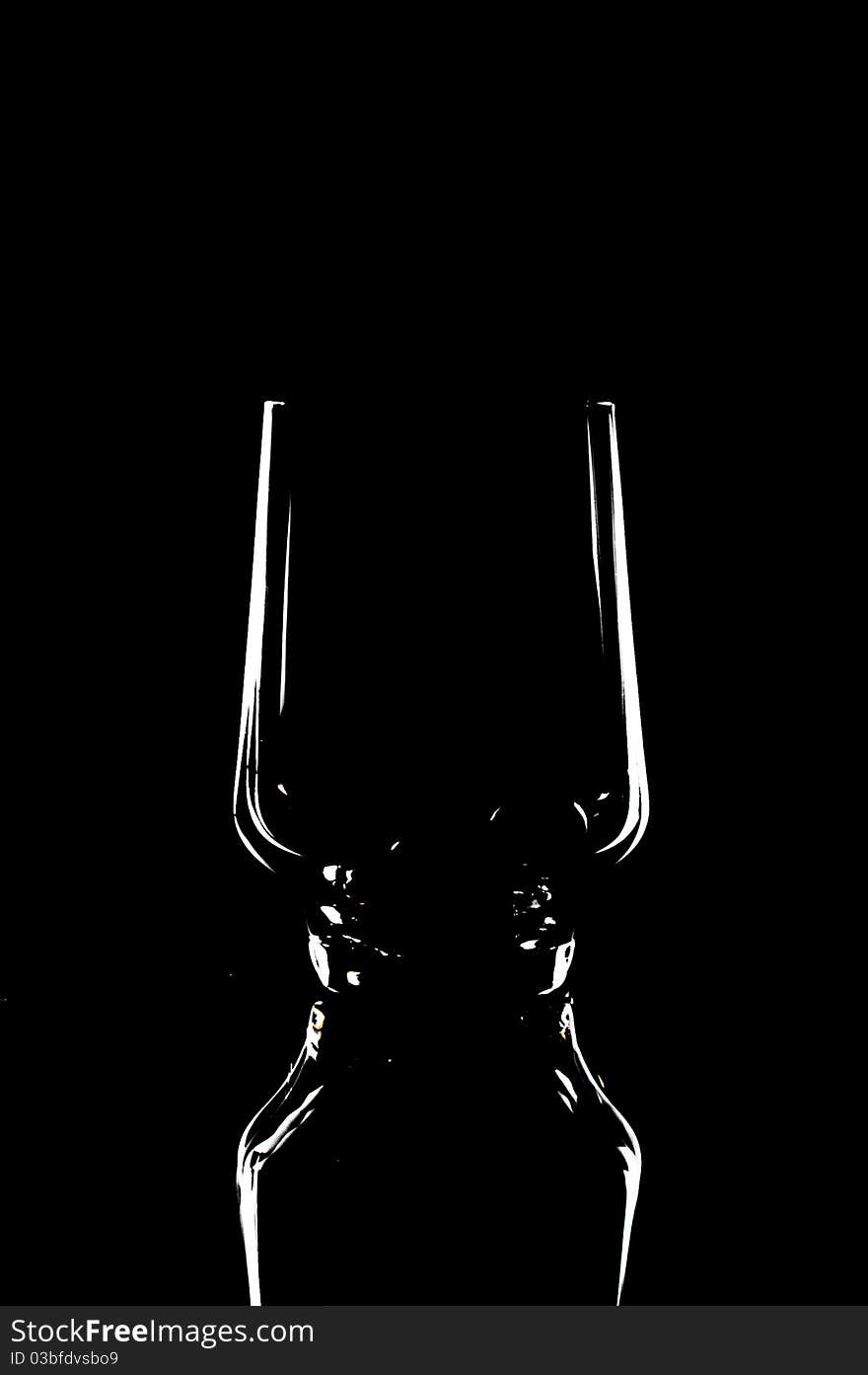 Contour t on a wine-glass glass empty on a black background. Contour t on a wine-glass glass empty on a black background