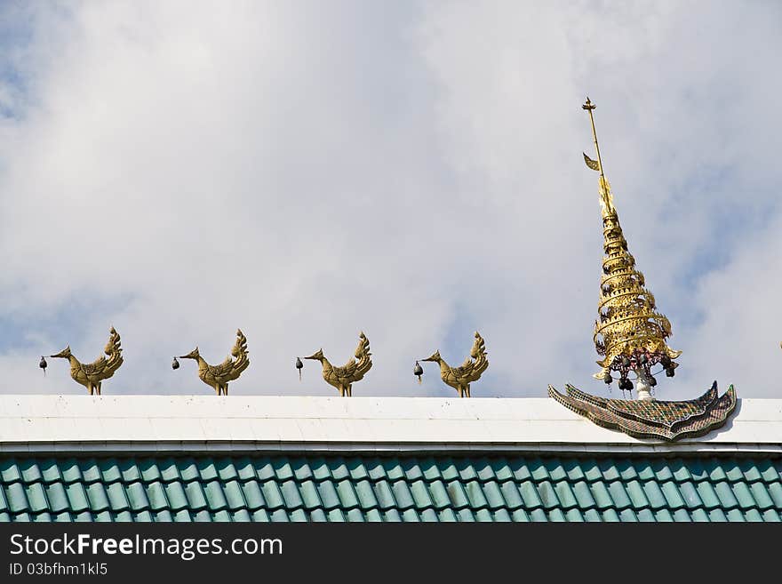 Top of Thai Church with cloudy