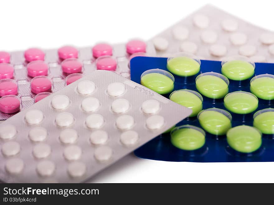 Packing pills isolated on a white background