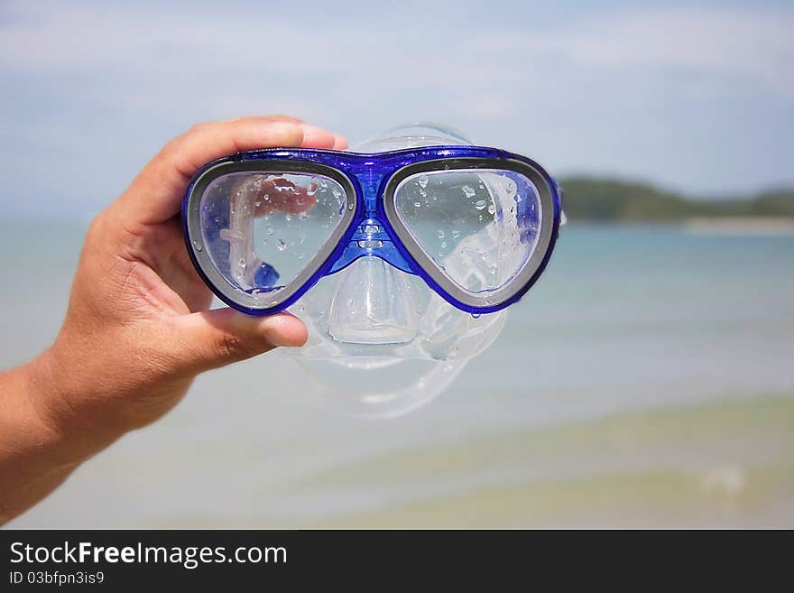 Diving Mask On Sea Background