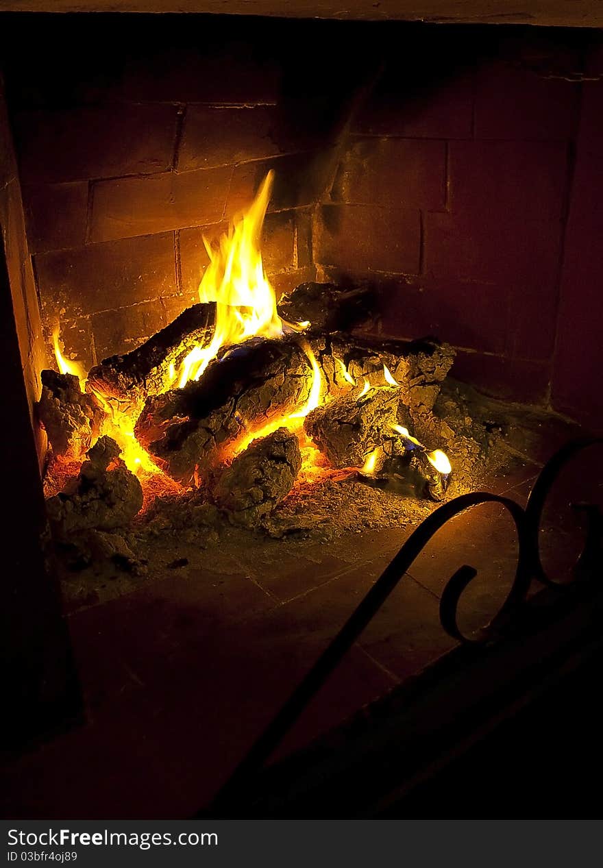 Logs burning in fireplace