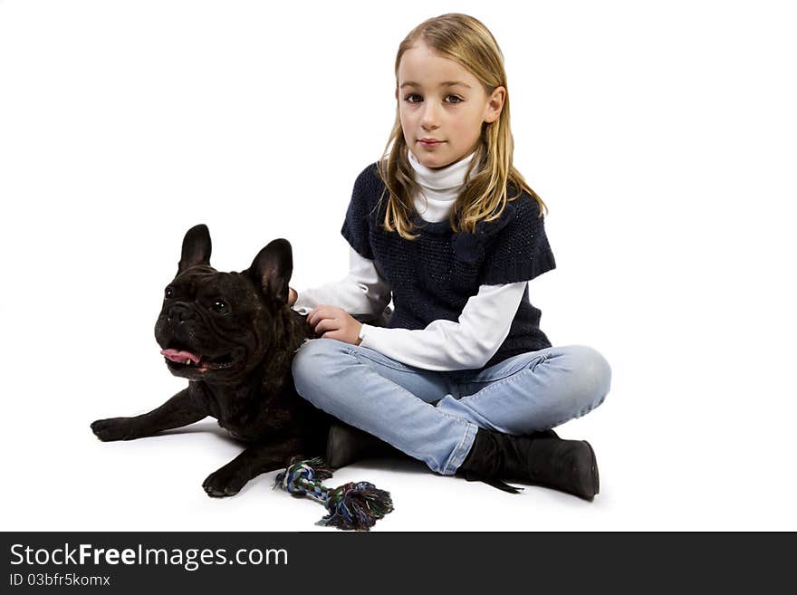 French bulldog and little girl playing isolated on white background