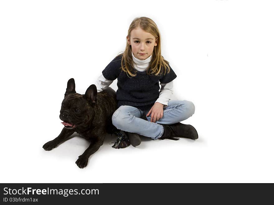 French bulldog and little girl playing isolated on white background