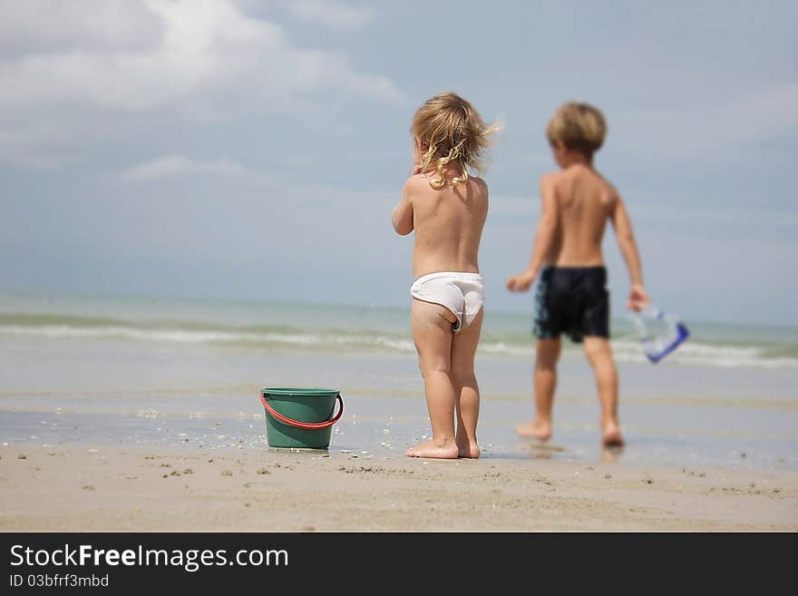 Children Playing On Beach