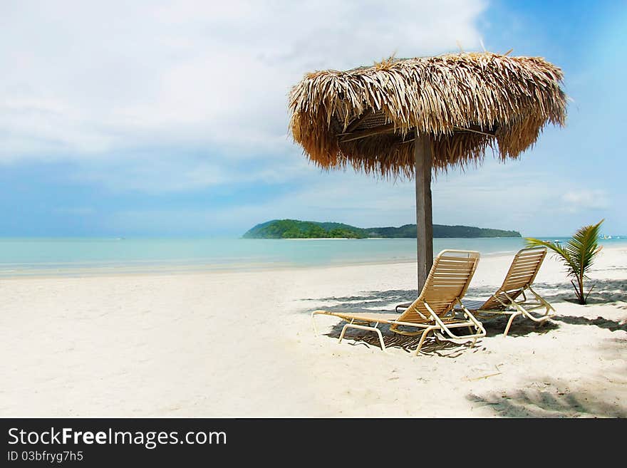 Chairs and umbrella on beach