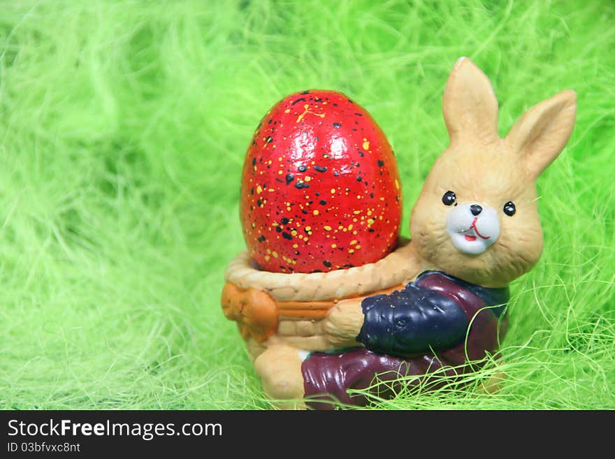 Cute easter bunny with eggs in a nest. Cute easter bunny with eggs in a nest.