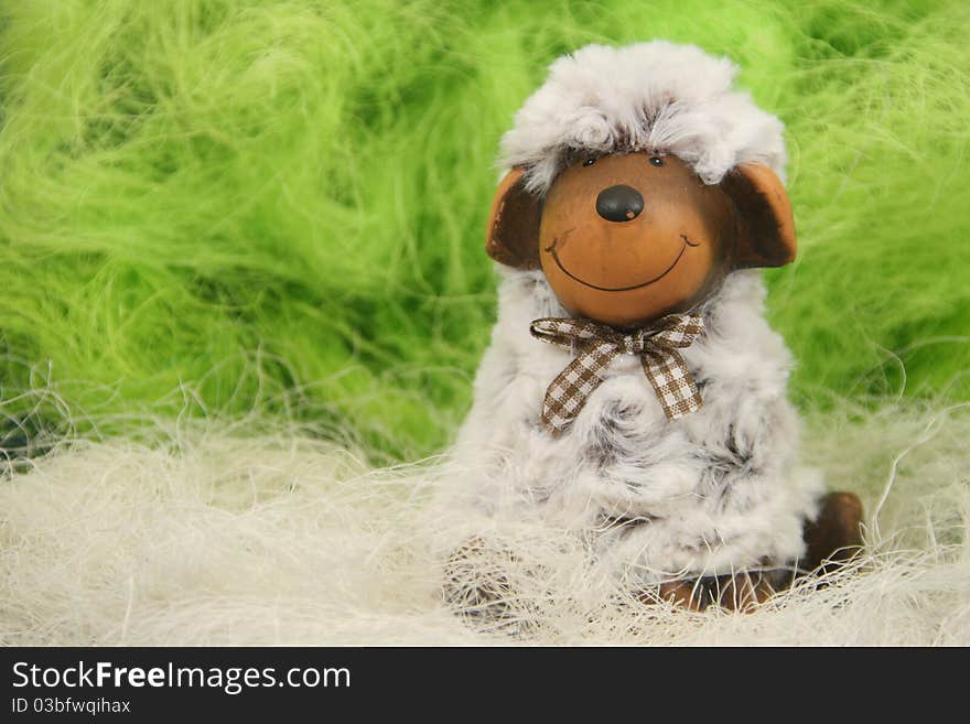 Cute easter sheep in a nest. Cute easter sheep in a nest.