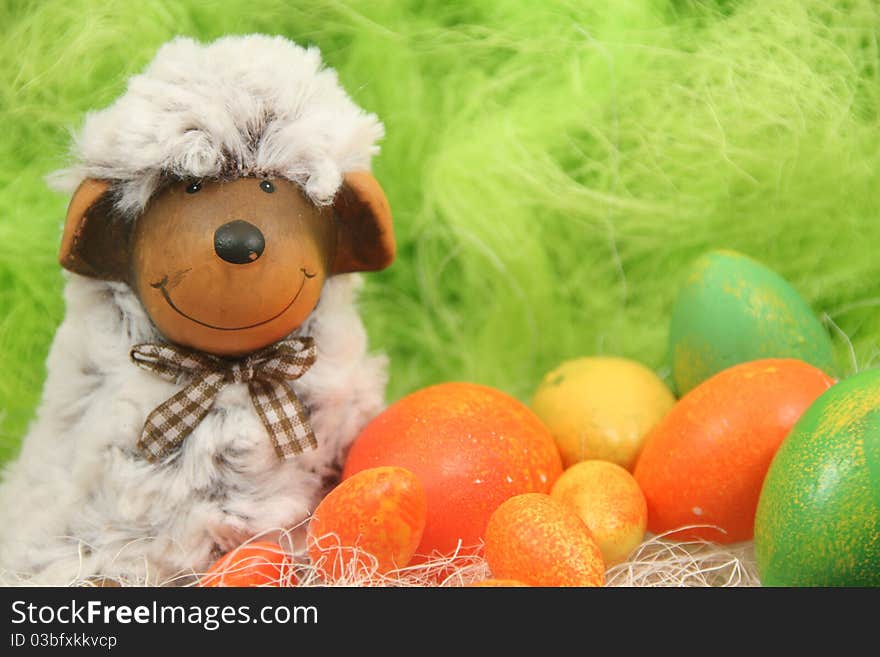 Cute easter sheep with eggs in a nest. Cute easter sheep with eggs in a nest.