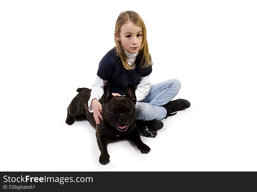 French bulldog and little girl playing isolated on white background