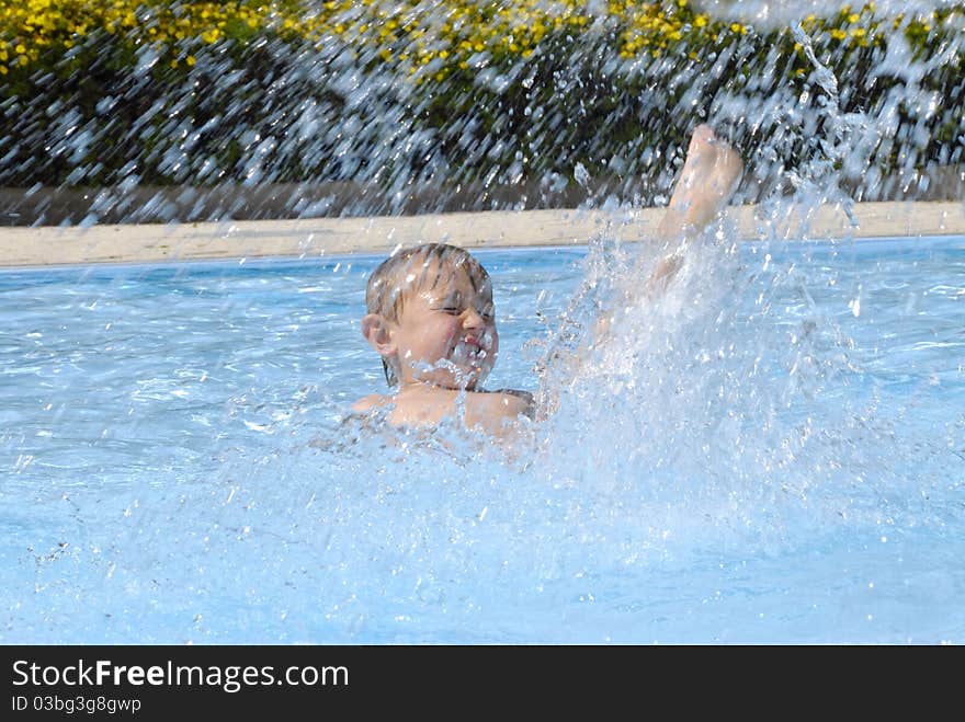 Blond boy in the pool.