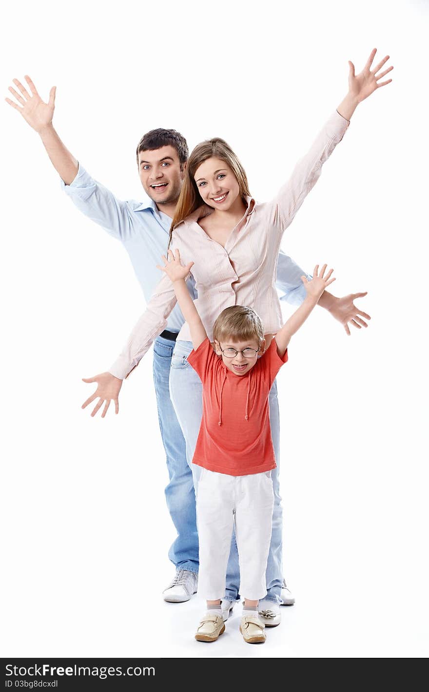 Smiling positive family on a white background. Smiling positive family on a white background