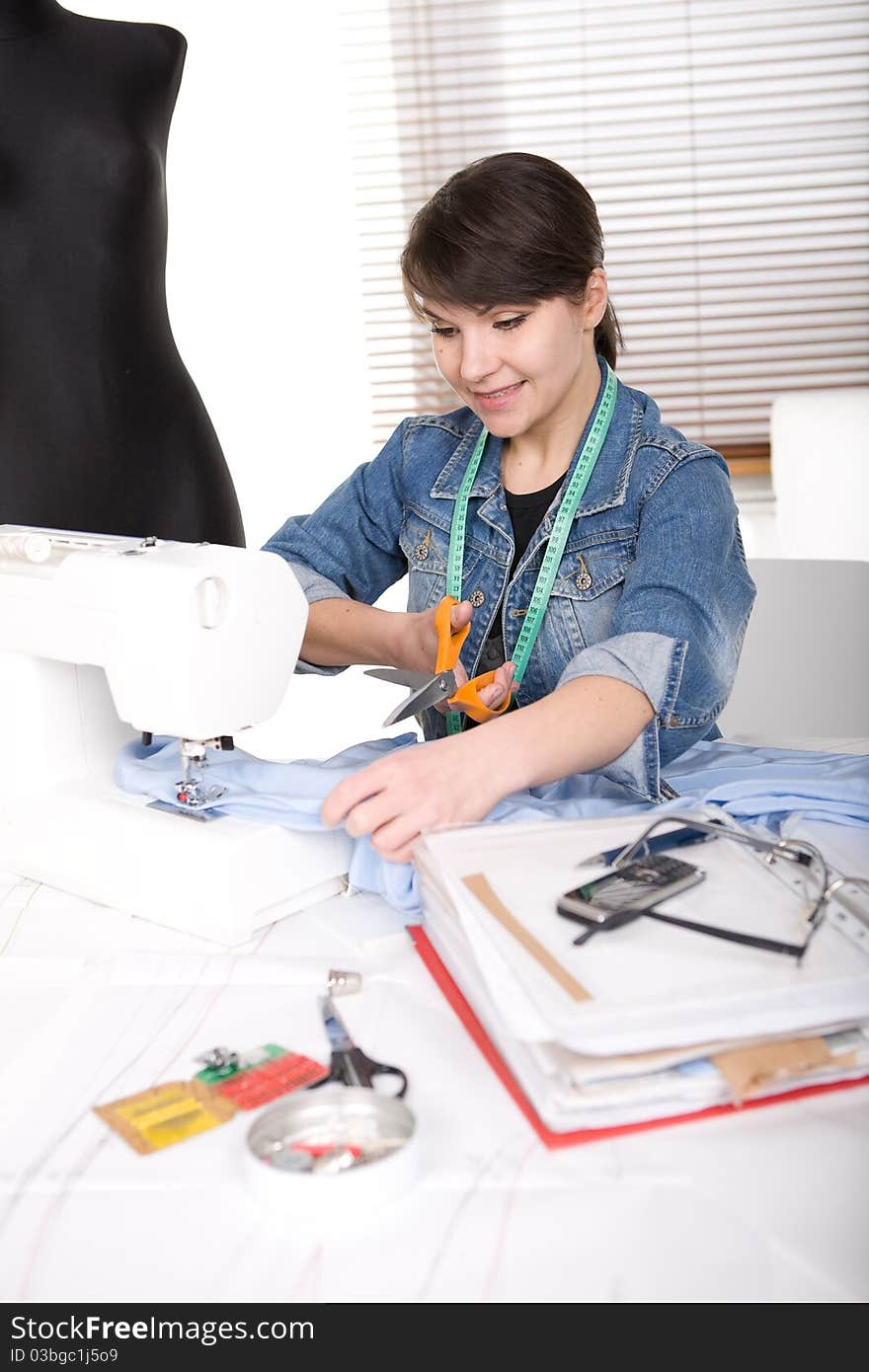 Young adult fashion designer at work