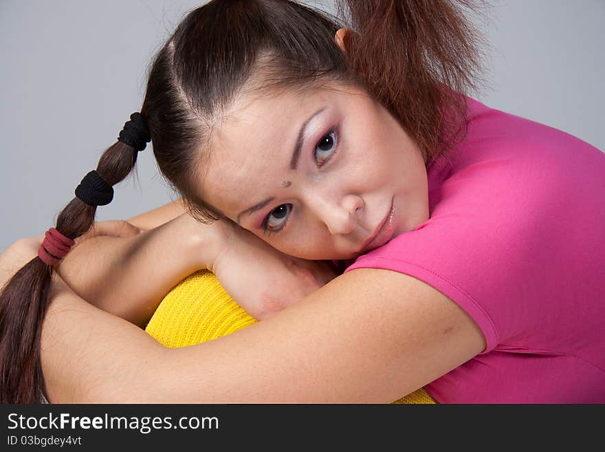 Young girl with pigtails in a short skirt