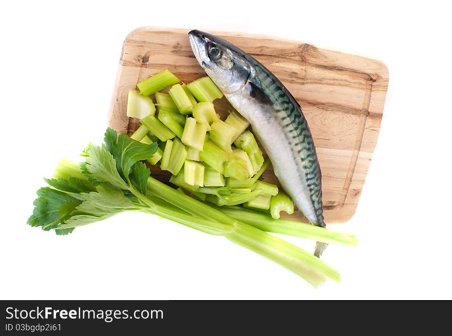 Mackerel and celery isolated on a white background.