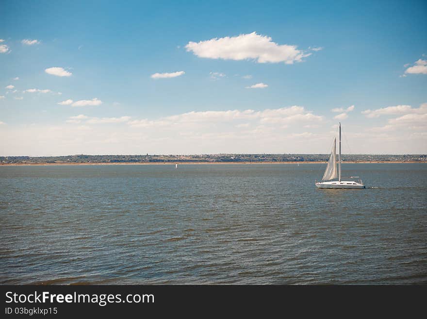 Boat under the sail in the sea