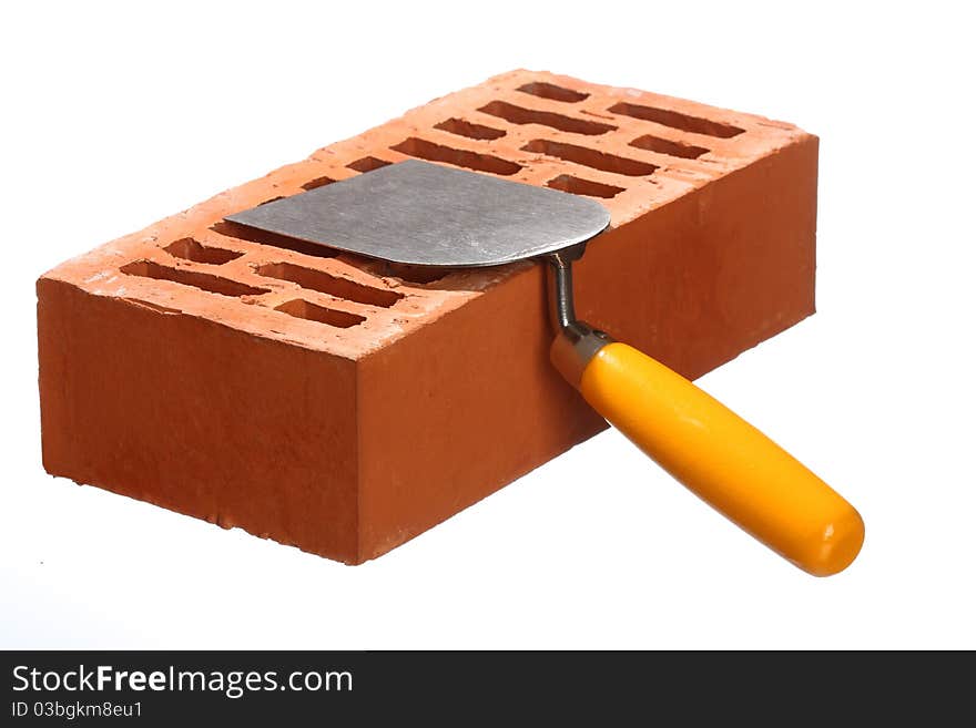 Trowel and a brick