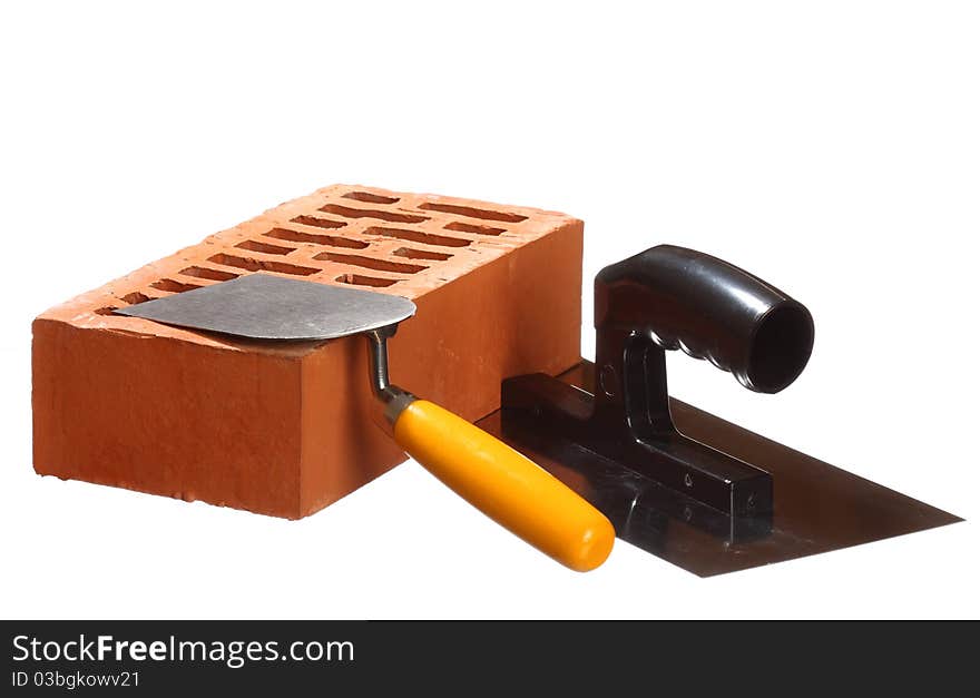 Trowels and a brick