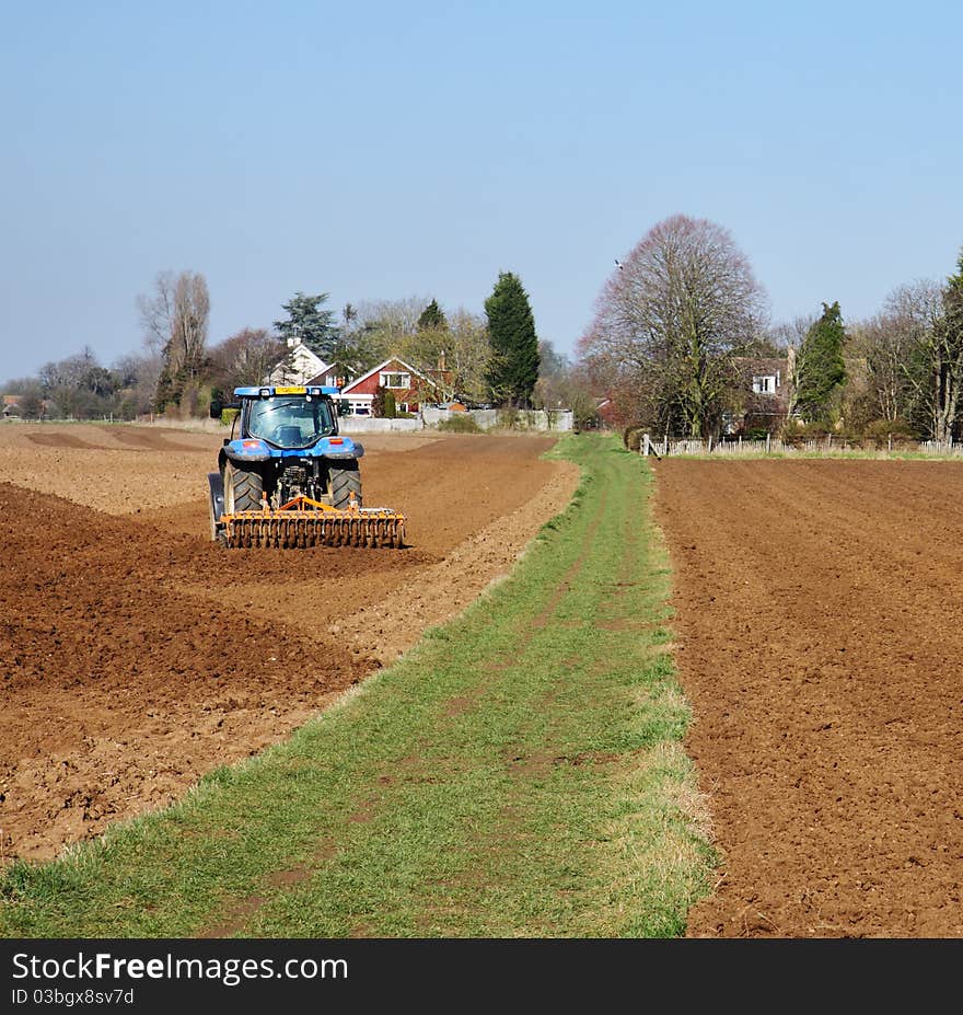 Tractor Ploughing a field