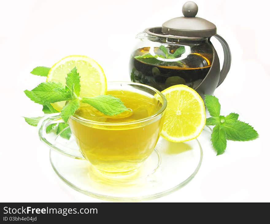 Fruit yellow tea with lemon and fresh mint. Fruit yellow tea with lemon and fresh mint