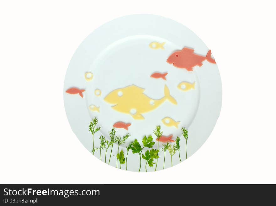 Cheese and meet fishes on white plate