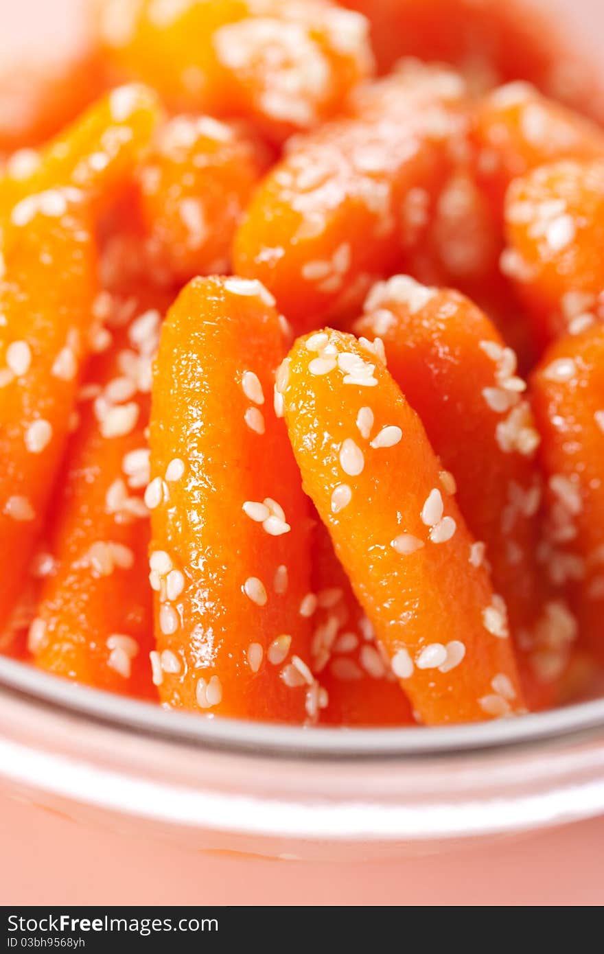 Honey glazed baby carrots with sesame seeds