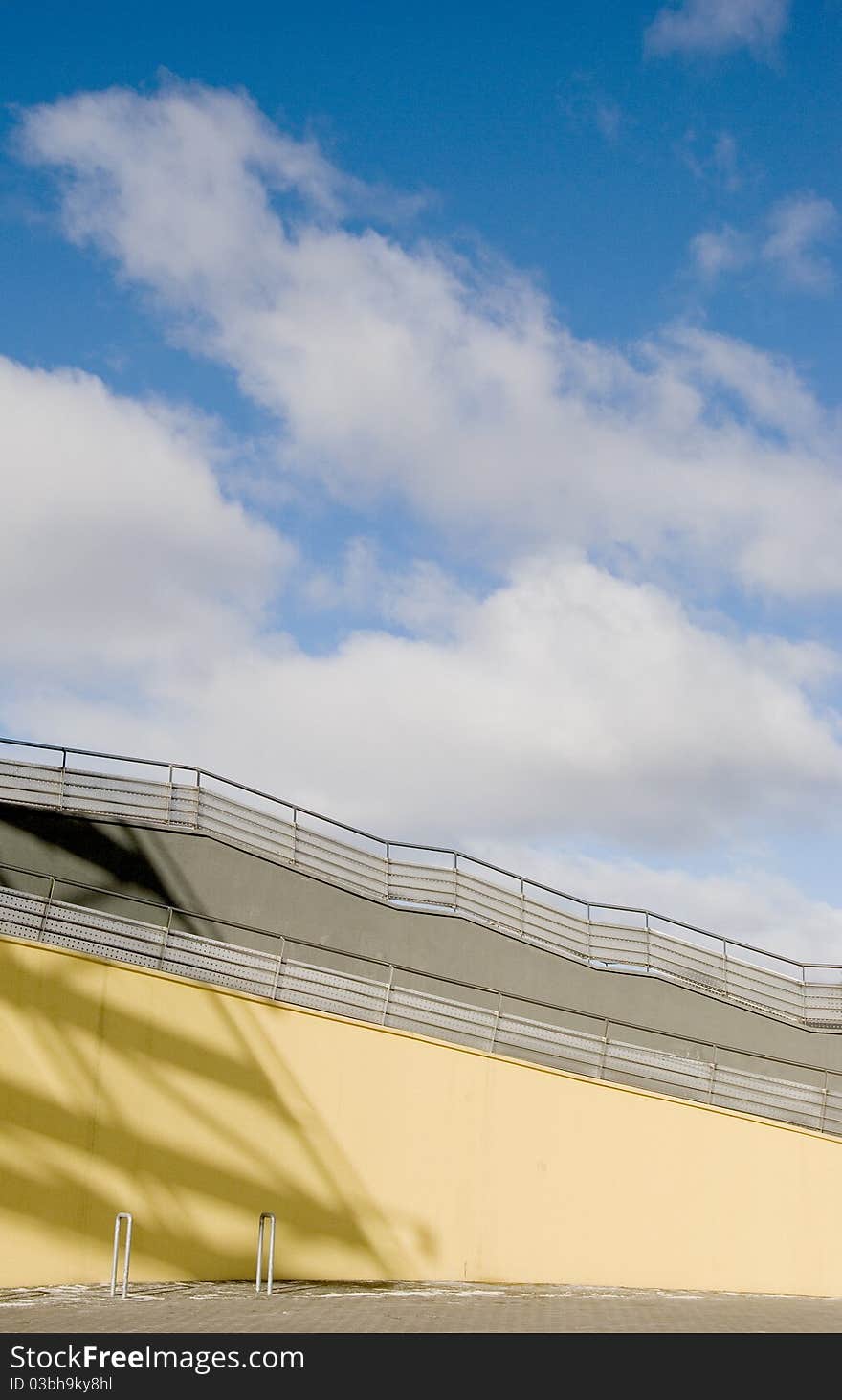 Staircase fragment on sky and clouds background